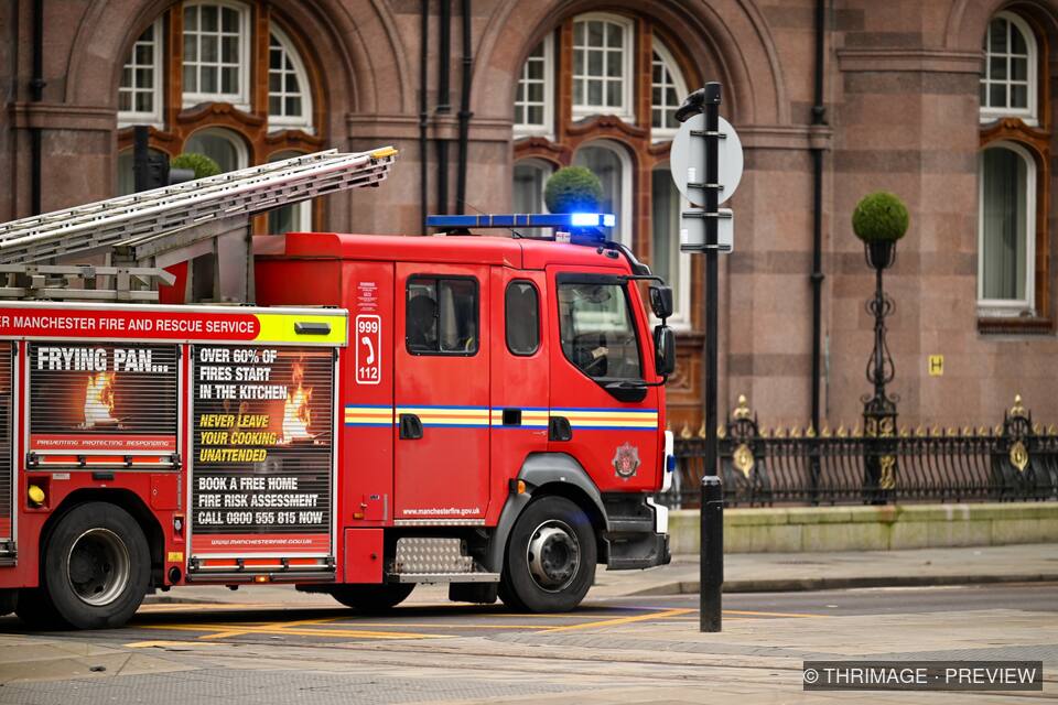 Greater Manchester fire engine on a city street